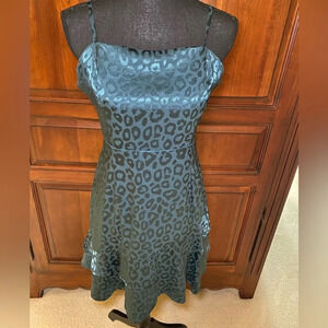 Women’s size M‎ tone on tone cheetah print dress in teal.Tags off-never worn
